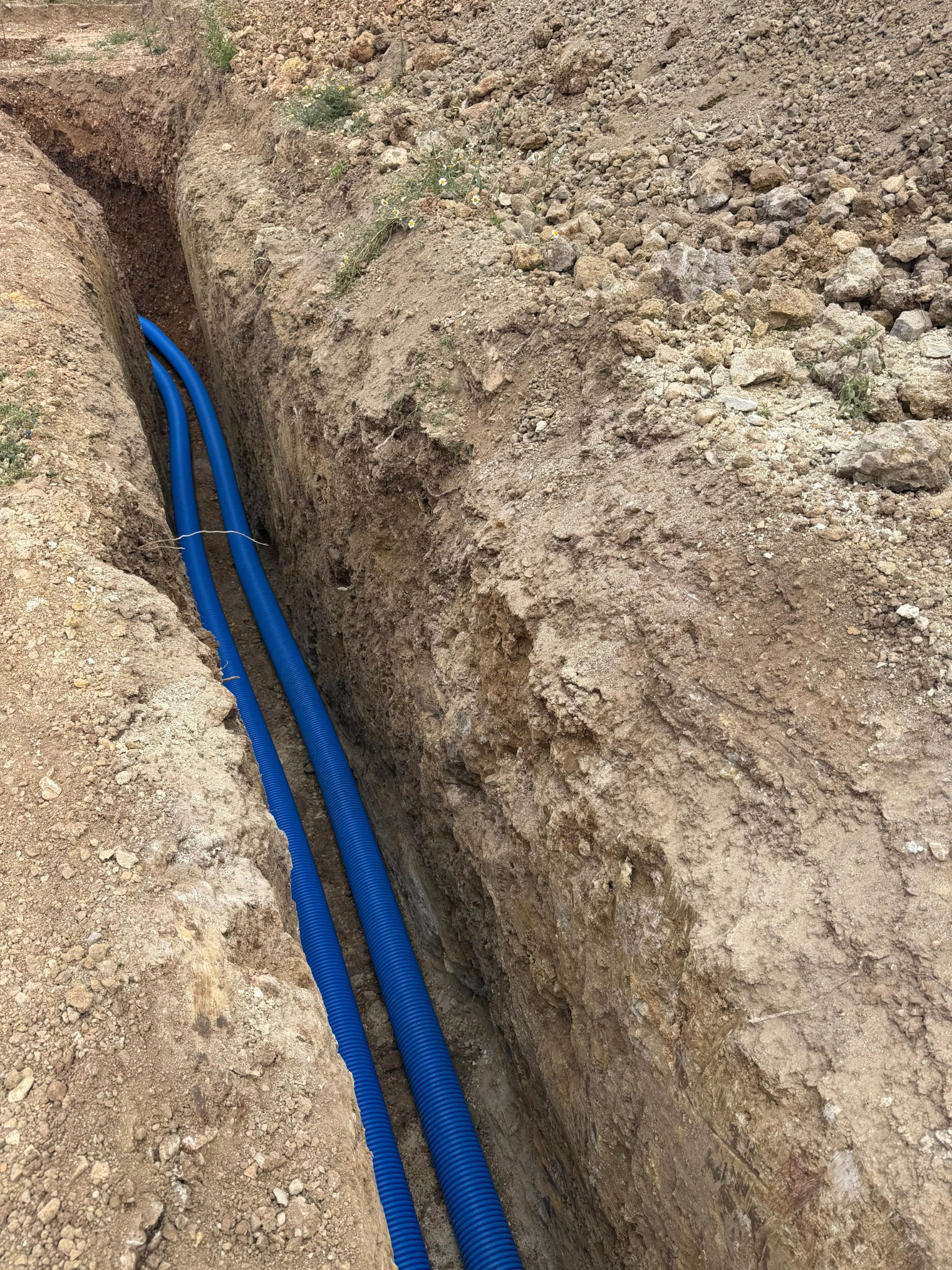 Instalación real de conductos enterrados para pozo canadiense RENair